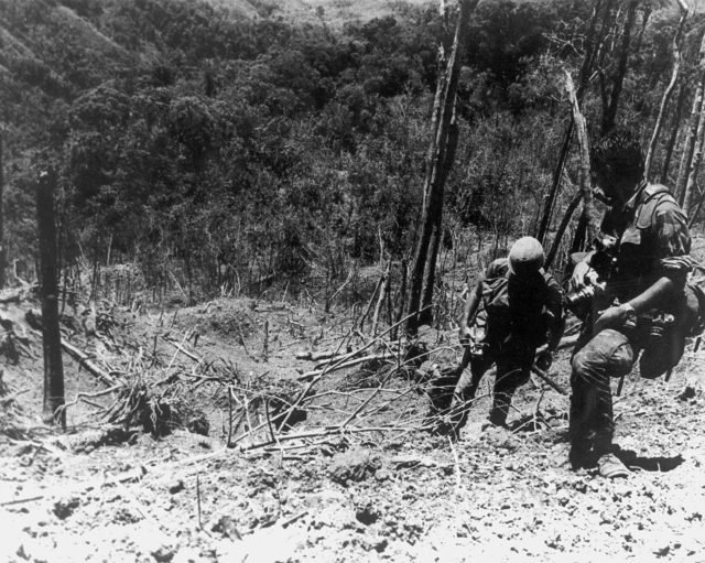 Soldiers_of_the_101st_Airborne_Division_climb_Hamburger_Hill_after_the_battle_in_May_1969