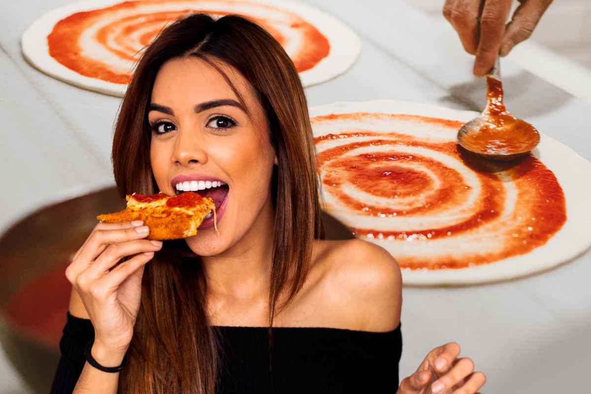 Ragazza mangia pizza