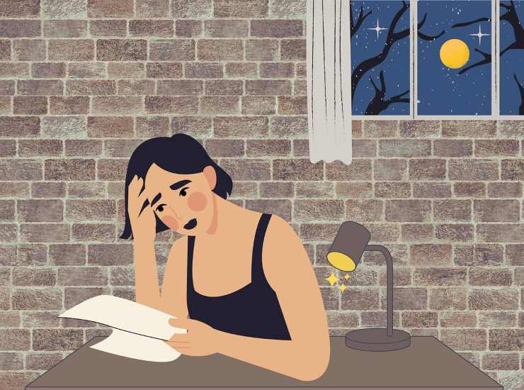 Una donna affranta per i debiti