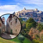 sfondo borgo e tondo con vicolo