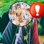 sfondo panni stesi, punto esclamativo emoticon e tondo con banconote euro