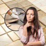 sfondo mattonelle pavimenti, tondo operaio che leva mattonelle e ragazza che pensa