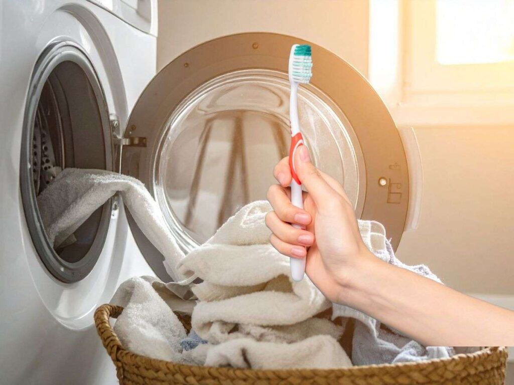 sfondo lavatrice e spazzolino da denti in mano