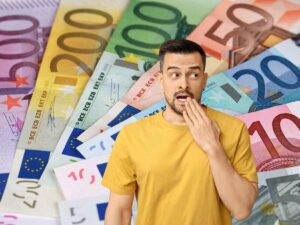 sfondo banconote euro e uomo sorpreso