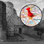 sfondo borgo in pietra e tondo con cartina di Milano